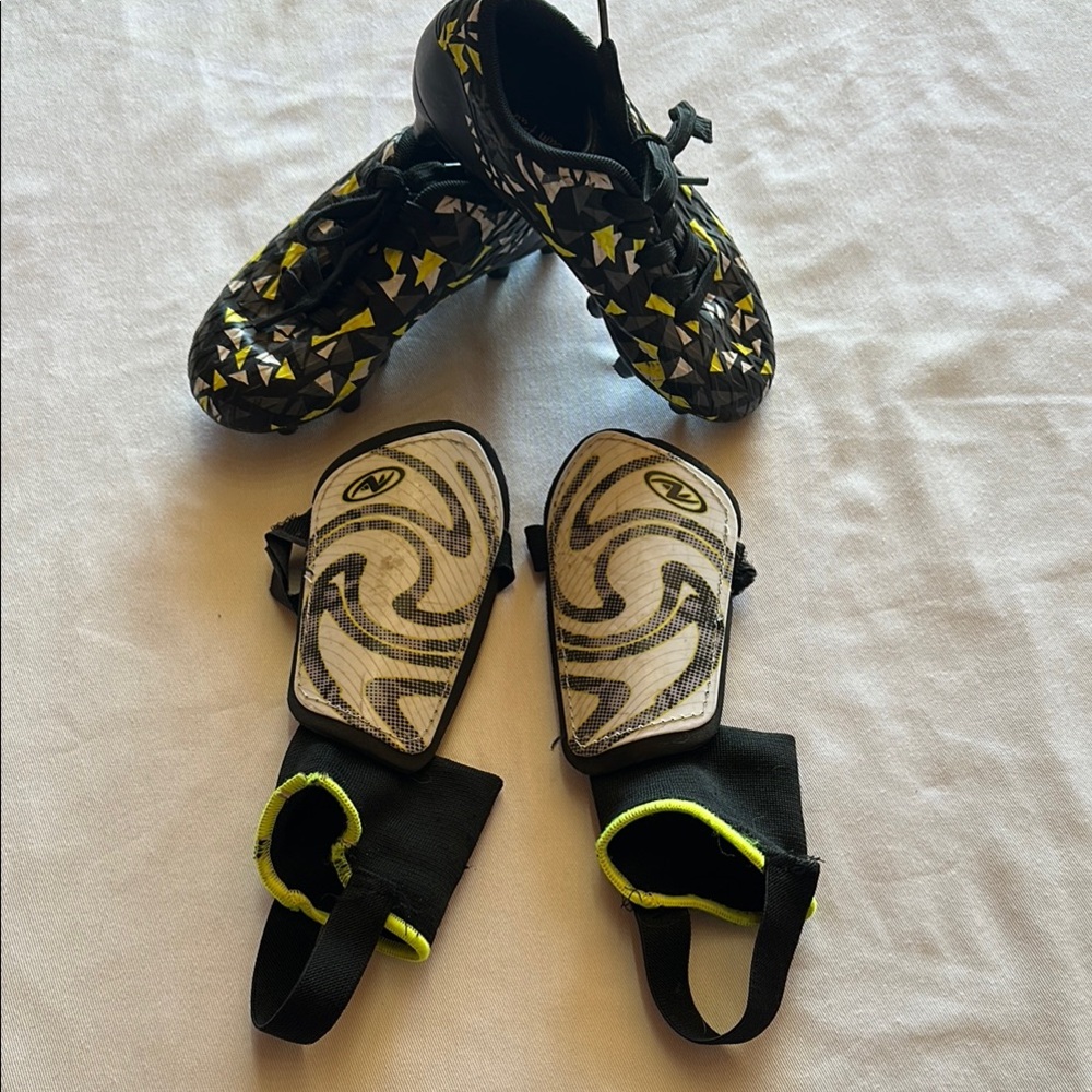 Set of Shin guards AND Kids Black and Yellow Soccer Shoes